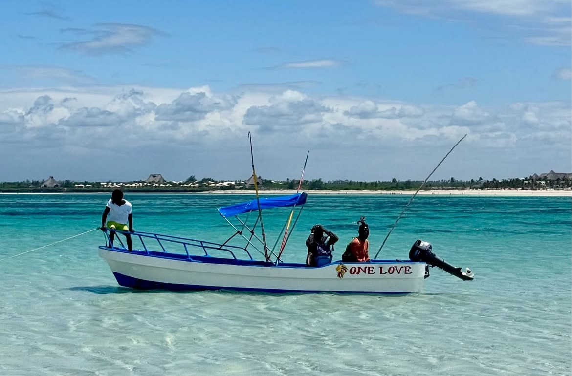 Pristine Watamu glass-bottom boat on clear coastal water